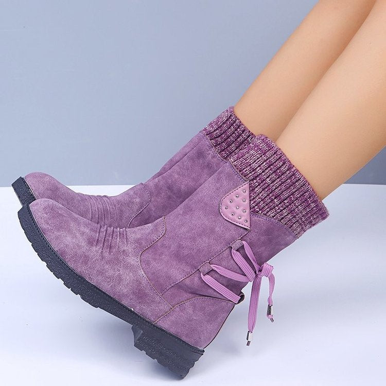 Snow boots for women with lace-up design, perfect for winter