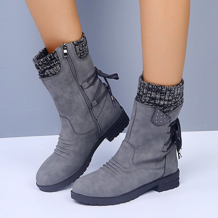 Snow boots for women with lace-up design, perfect for winter