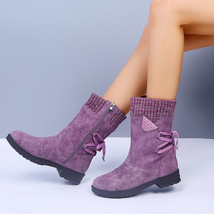 Snow boots for women with lace-up design, perfect for winter