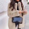 Women's Solid Color Long Sleeve Lapel Faux Fur Coat with a Stylish Temperament